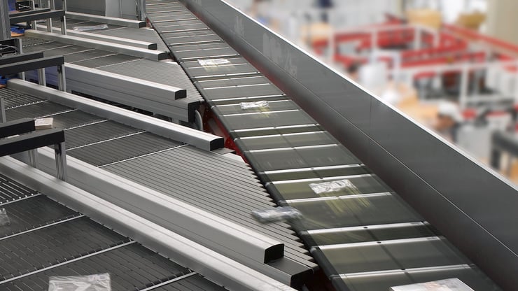Sjolund-Blog-Moving-conveyor-systems-with-precision-bent-components-Compact-sorter-1920x1080 